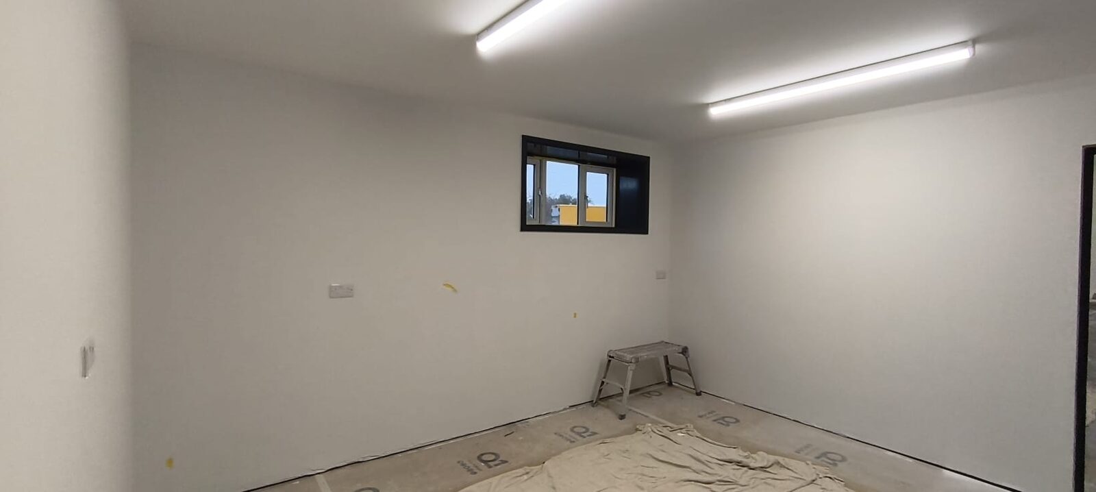 LED batten lighting installation in a commercial unit